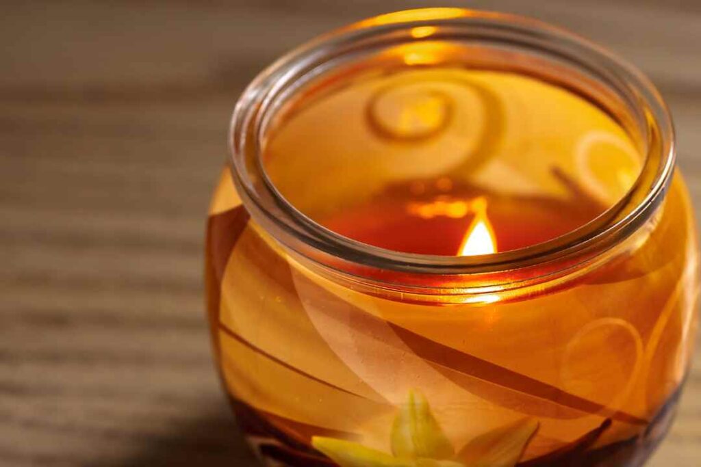Beautiful golden candle glass jar