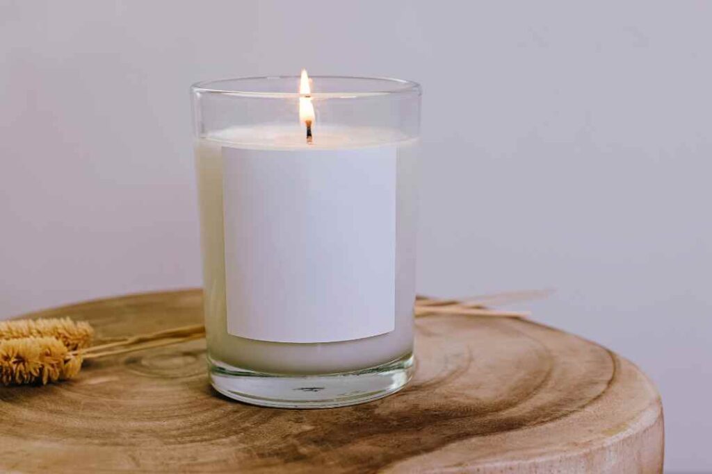 beautiful white glas candle wax jar